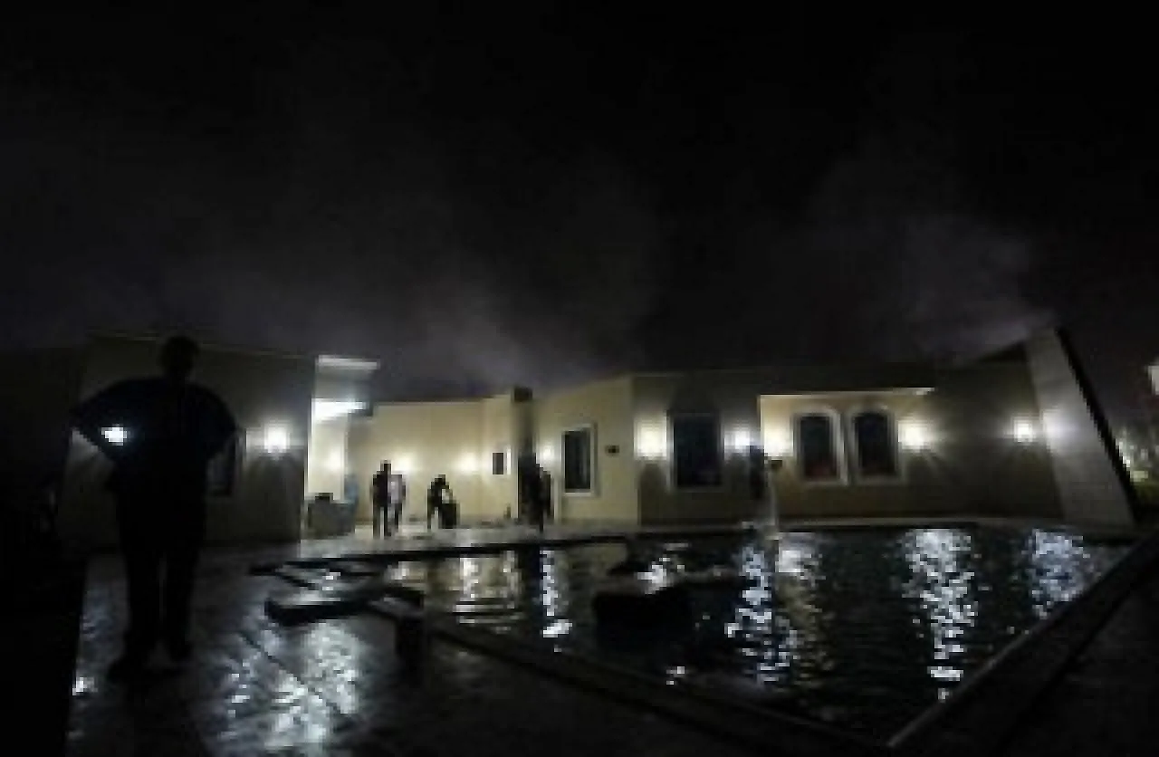 A2m7ElCCYAArQVj Benghazi youth said to be cleaning the US consulate in the aftermath of the attack (Photo: via @EmadDlala)