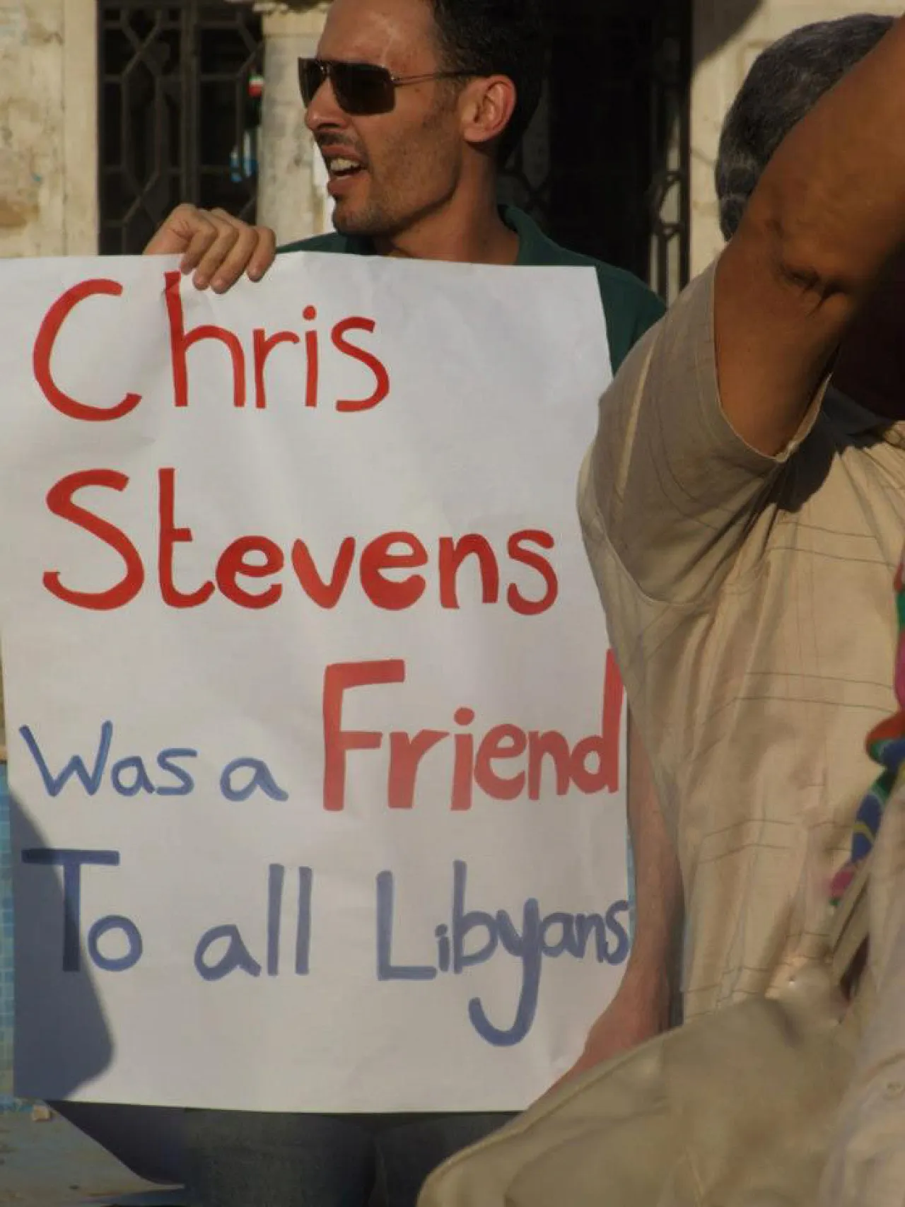Bengahzi Stvesn demo 2 A protester in Benghazi holds a placard expressing a sentiment felt amongst many Libyans.