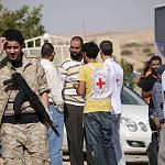 Bani Walid residents say military in control of surrounding districts as tens of thousands flee