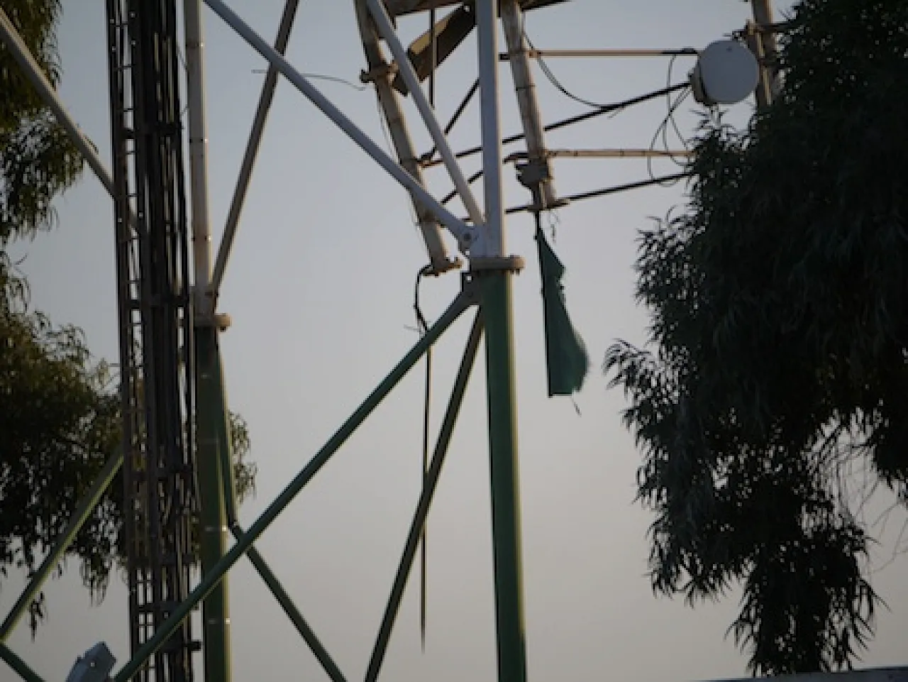 A Green flag flies from a pylon close to Sirte town centre. (Photo: George Grant)