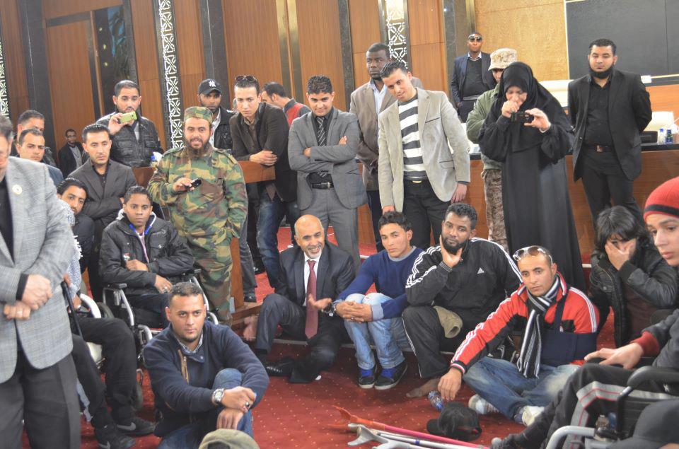 Damaged GNC building vacated by squatting amputees – finally