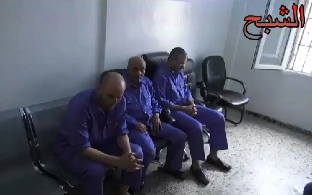 Detained men metiga Grab from a video purporting to show the three men in detention