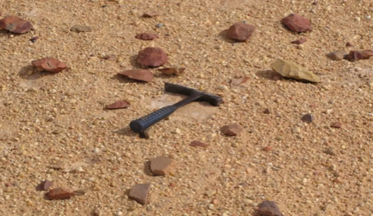 Fig 9 Figure 9: Palaeolithic rock tools scattered around the inter-dune lakes, Idhan Murzuk.