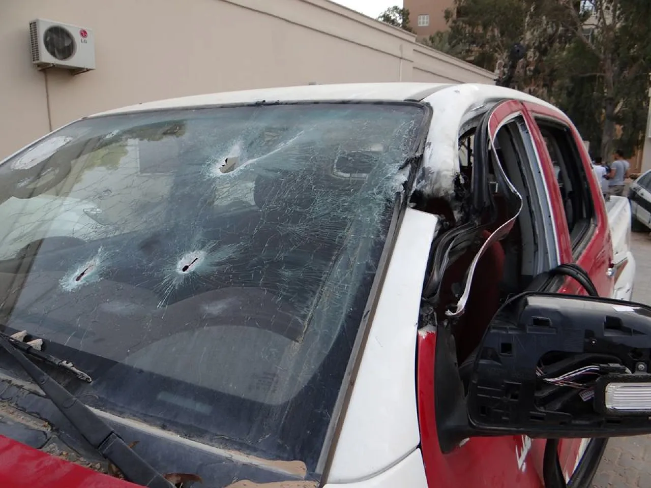 Police car damaged in the clash (Photo: PFG Facebook)