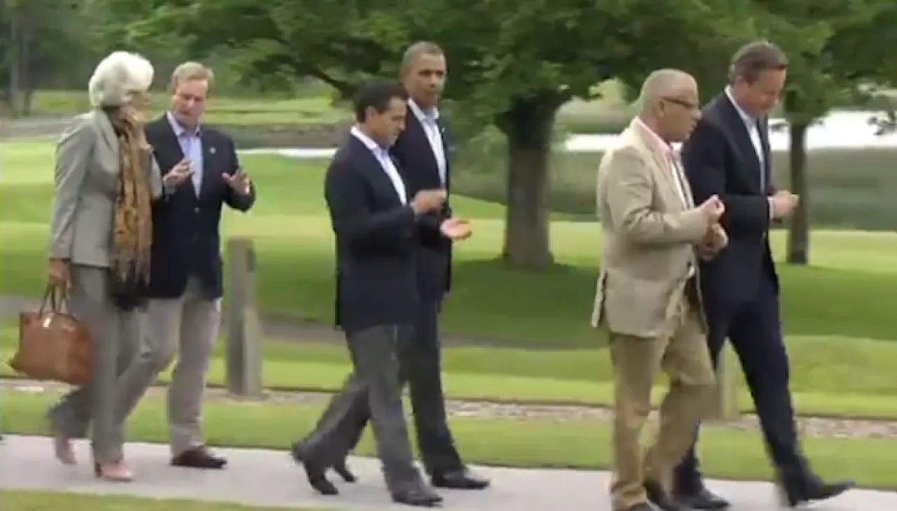 Prime Ministers Ali Zeidan and David Cameron walk to the Leaders' Lunch at the G8 Summit in Northern Ireland