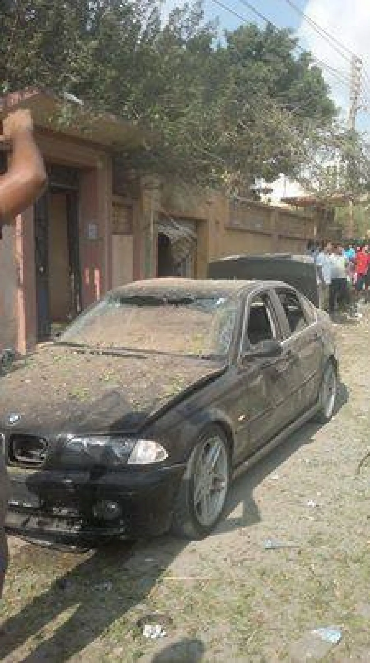 Damaged car outside the consulate