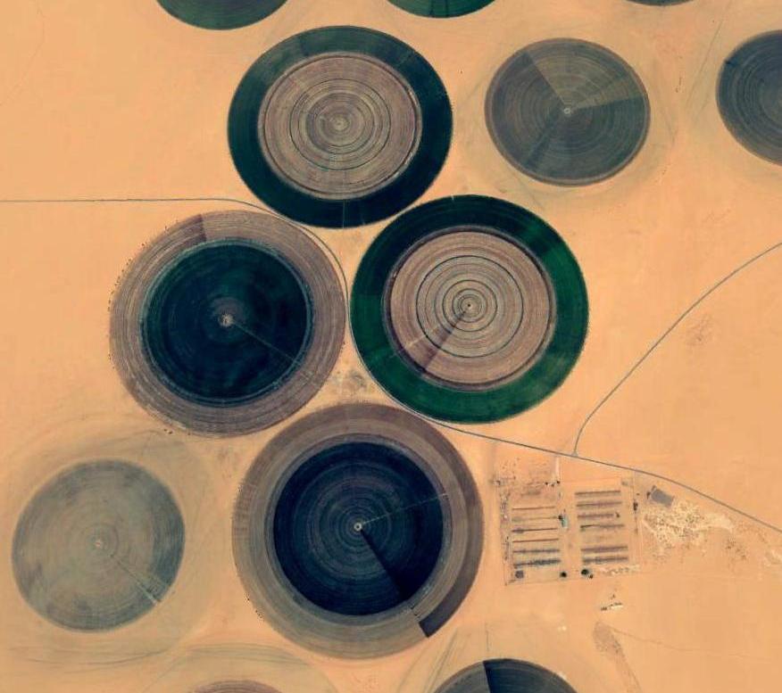 A satellite image of the agriculture project in Al Kufra, functioning thanks to the fossil water resources available in the desert area. These resources which were discovered since the mid-1960s, are now being tapped not only for agriculture purposes but also are part of the Man-Made River, where water is piped toward the coastal towns and cities in the north.