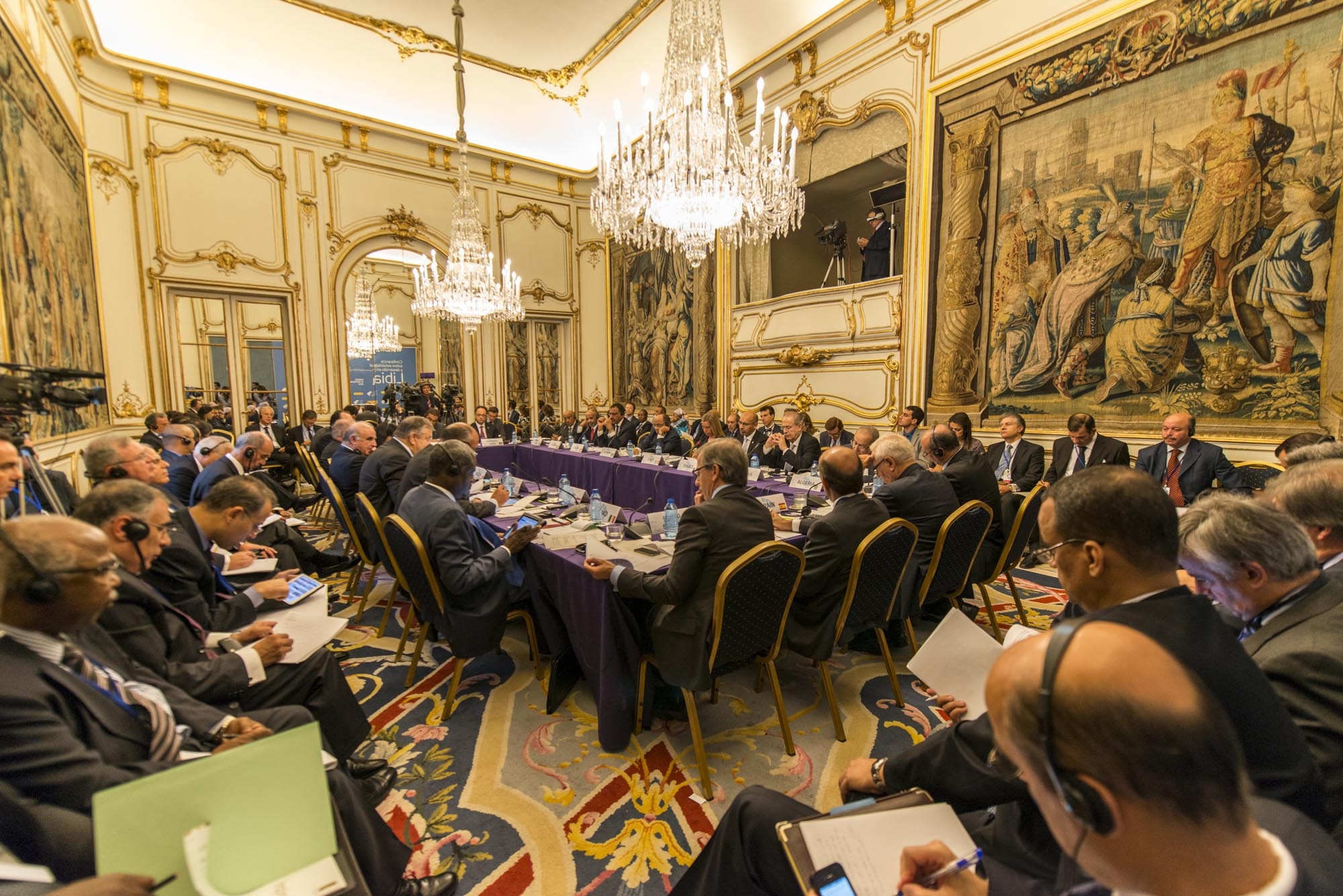 Pessimism at Madrid conference but delegates reject military action