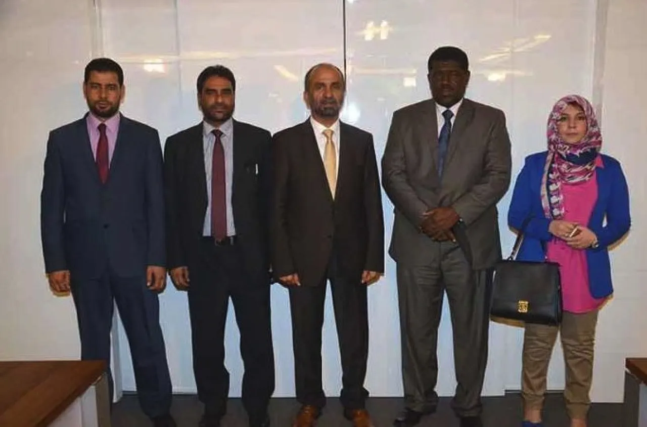 The Libya member of the Arab Parliament with Ahmed bin Mohammed Al-Jarwan