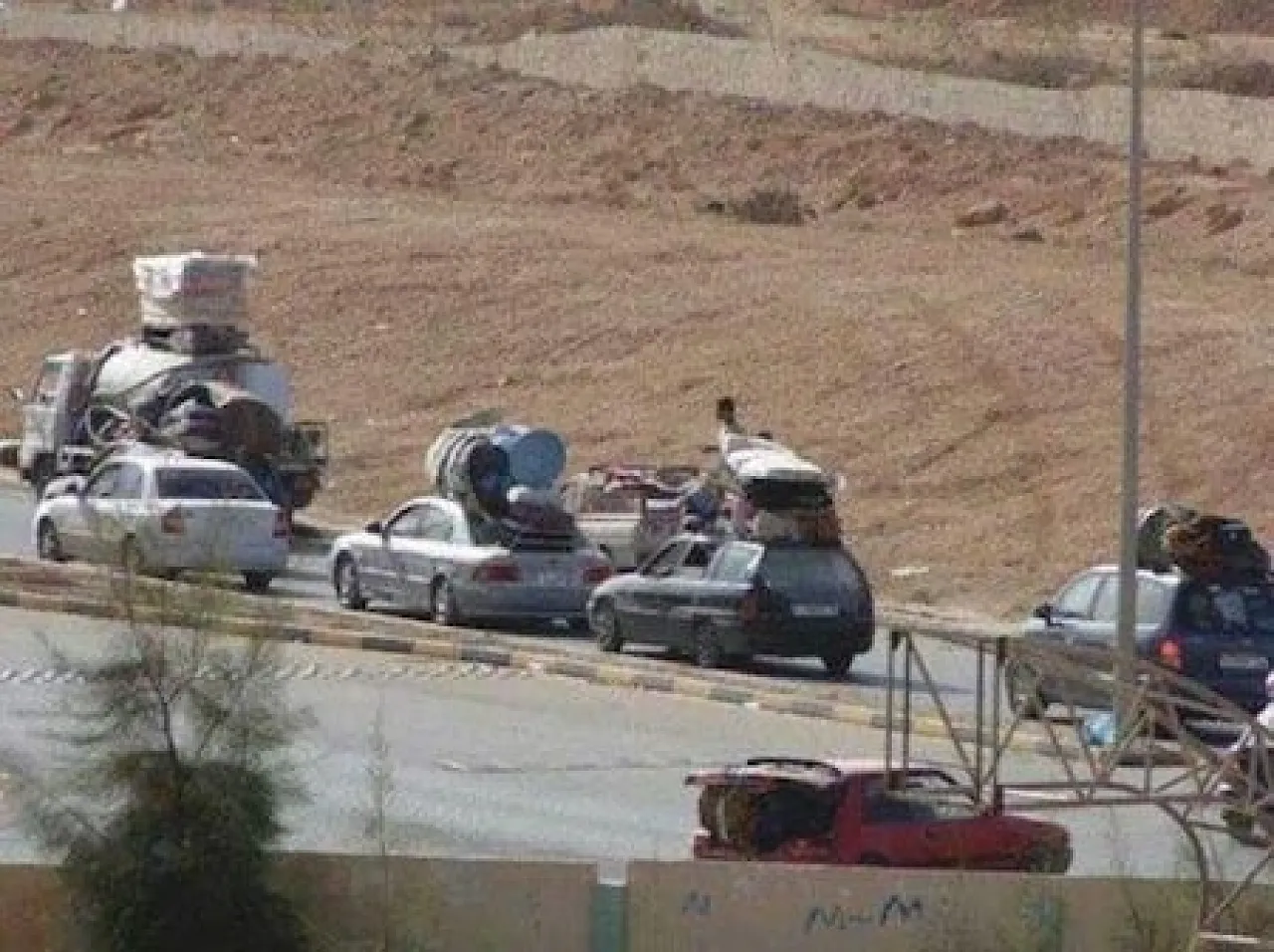 Families flee the fighting in Benghazi