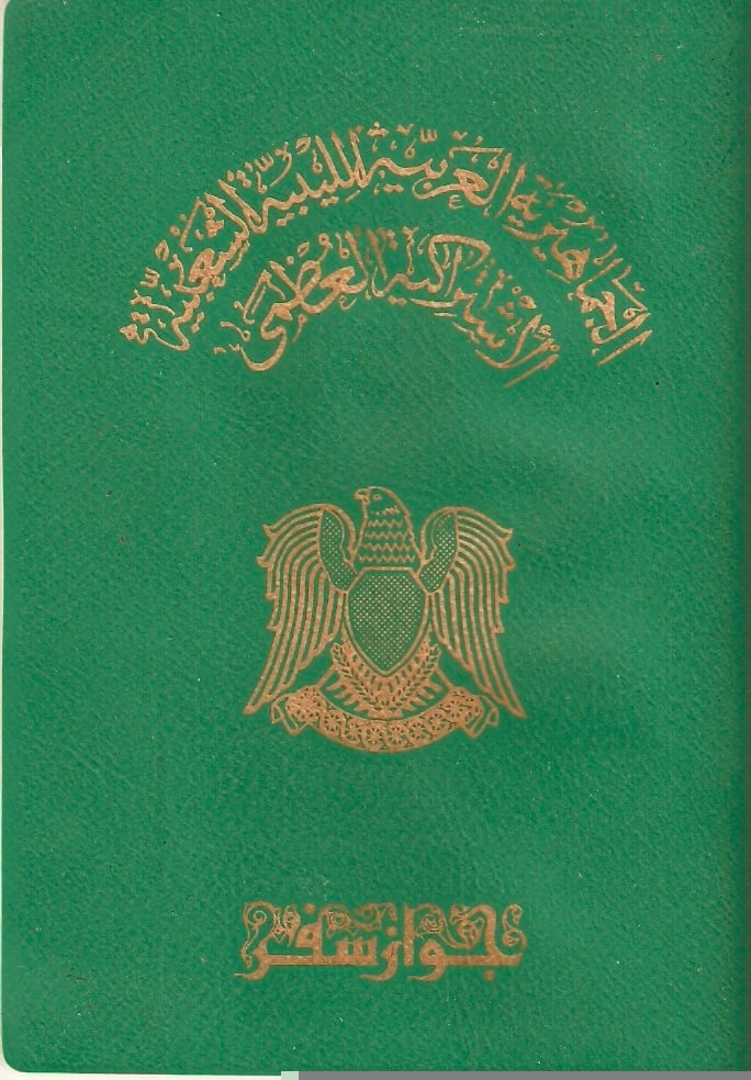 The details of the old Qaddafi-era Libyan passports were written by hand.