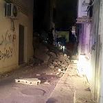 Children dug from Tripoli building collapse