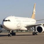 A new Libyan plane flies in as an old one flies out