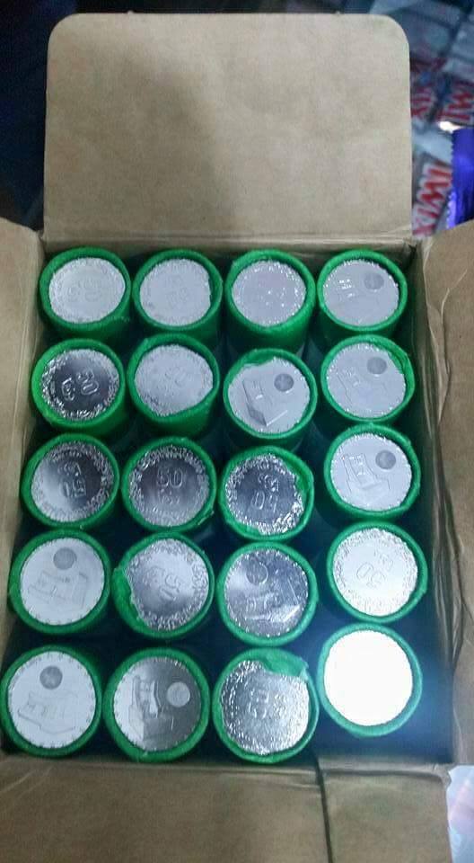 Tripoli bank with no notes gives pensioners sacks of coins
