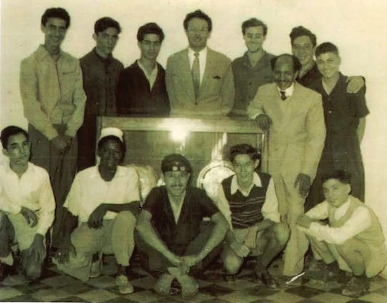 Figure 6: A photo of Guido Angelini (centre) with his students, who became master smiths and who then passed the techniques learned to later generations (Photo: courtesy of A. Shakshouki).