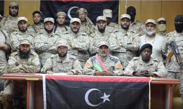 BDB leader Mustafa Sharksi with BDB militiamen (Photo BDB)