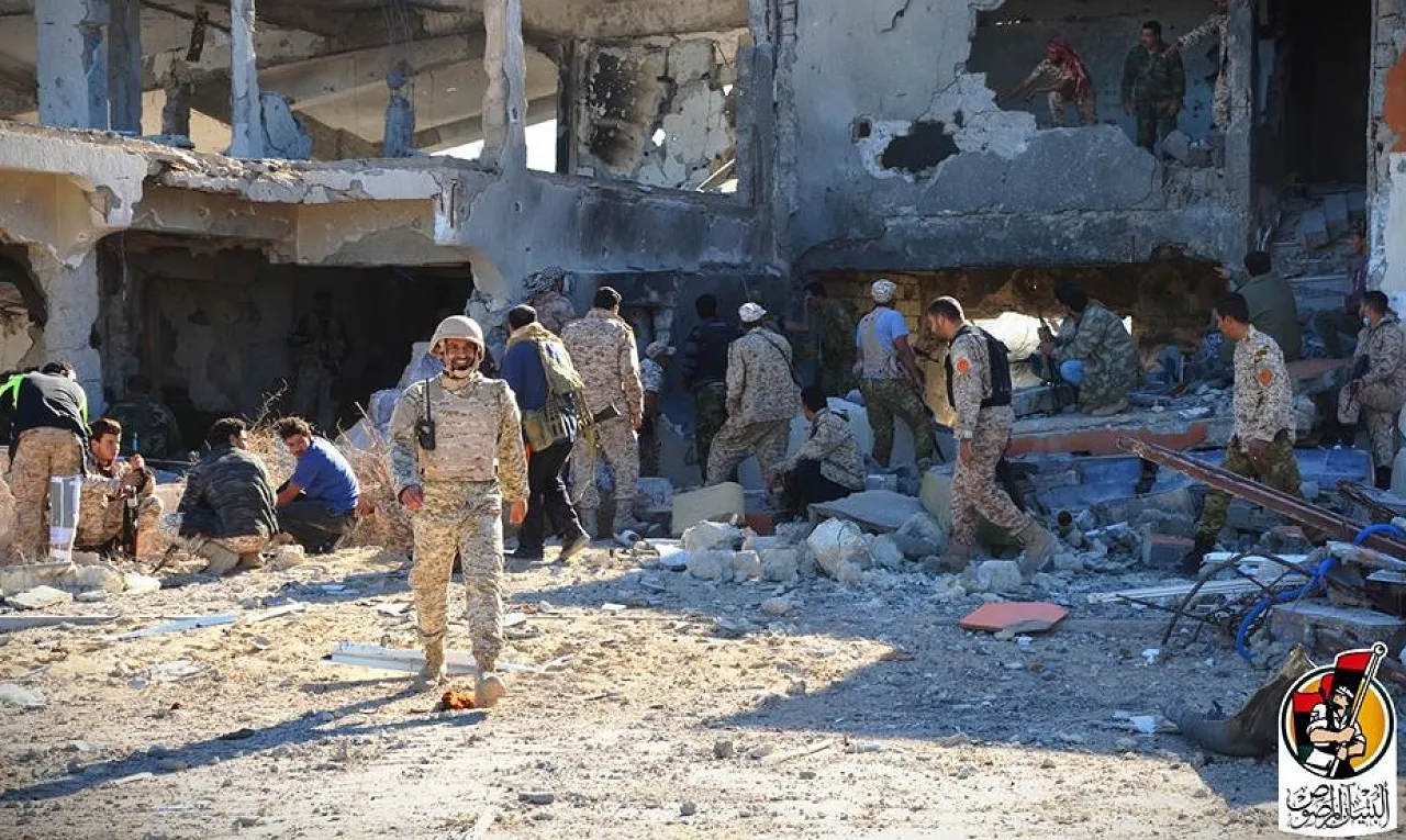 Triumphant BM fighters in the rubble of Ghiza (Photo: BM)