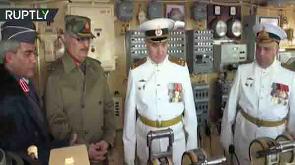 Hafter helicoptered to Russian carrier for formal visit