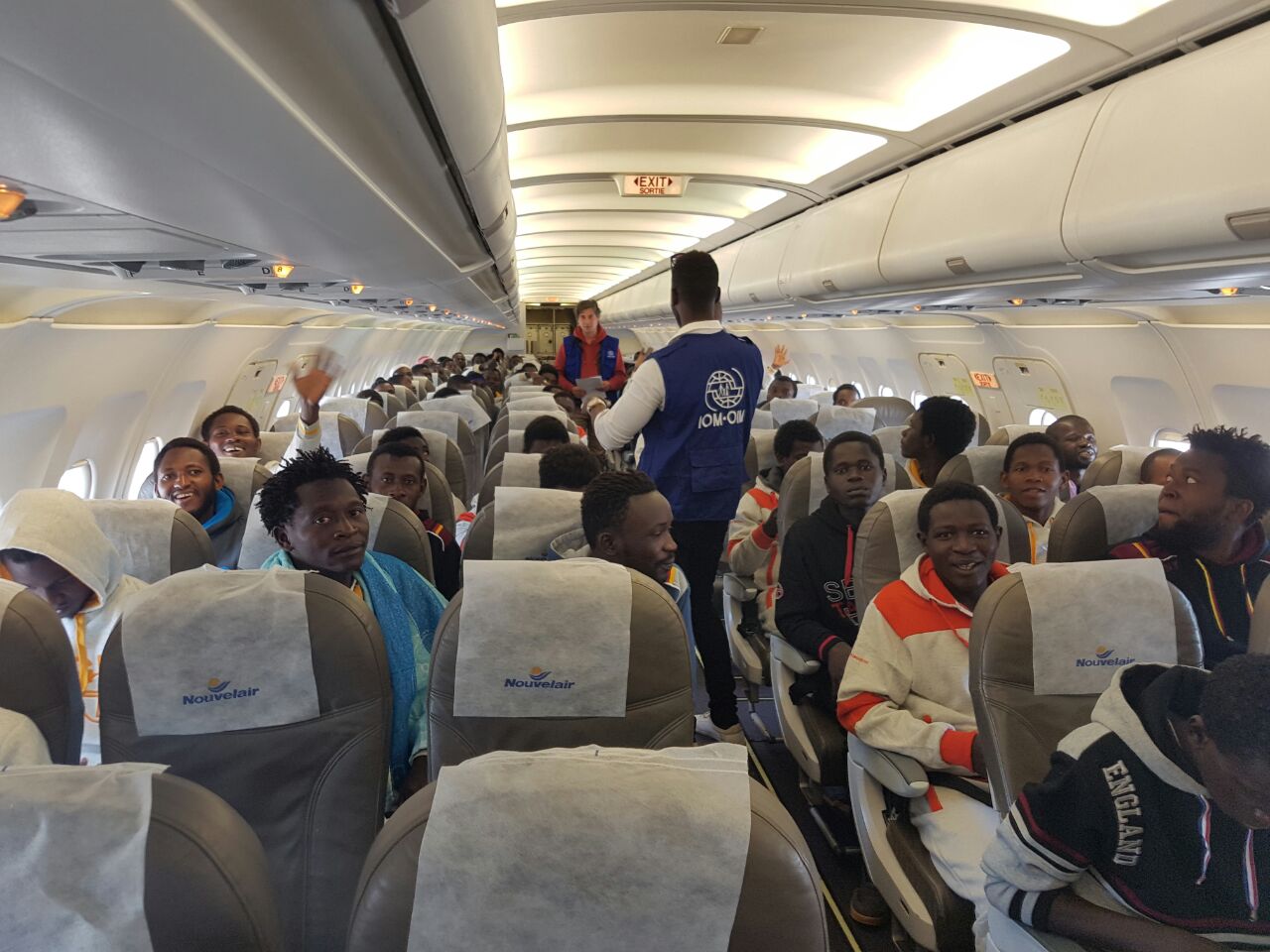 Fearful migrants crowd Guinea embassy after missed flight